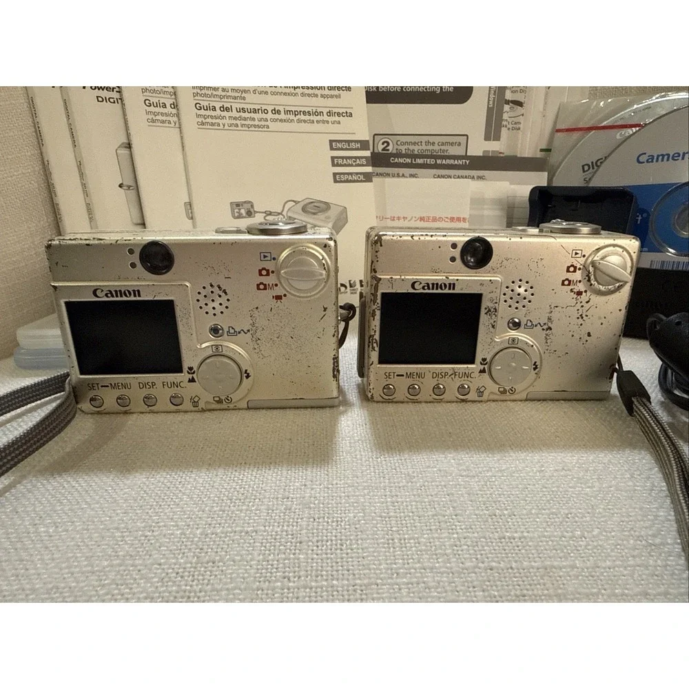 2 - Canon PowerShot SD110 Digital ELPH Camera W OEM Charger‎ - For Parts READ